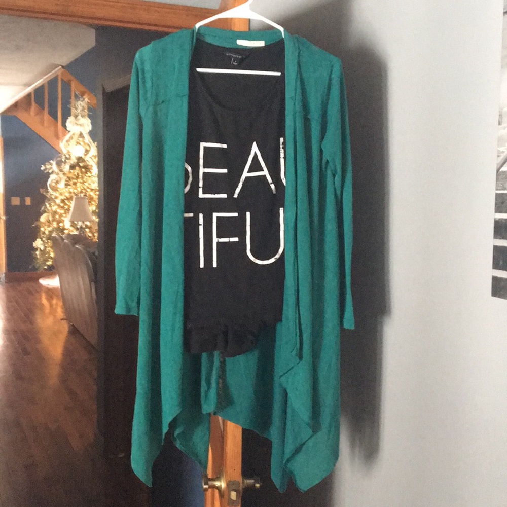 Green cardigan with black tank underneath both Sm.